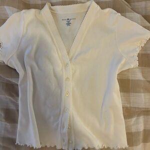 Brandy Melville ruffle trip button crop top in white